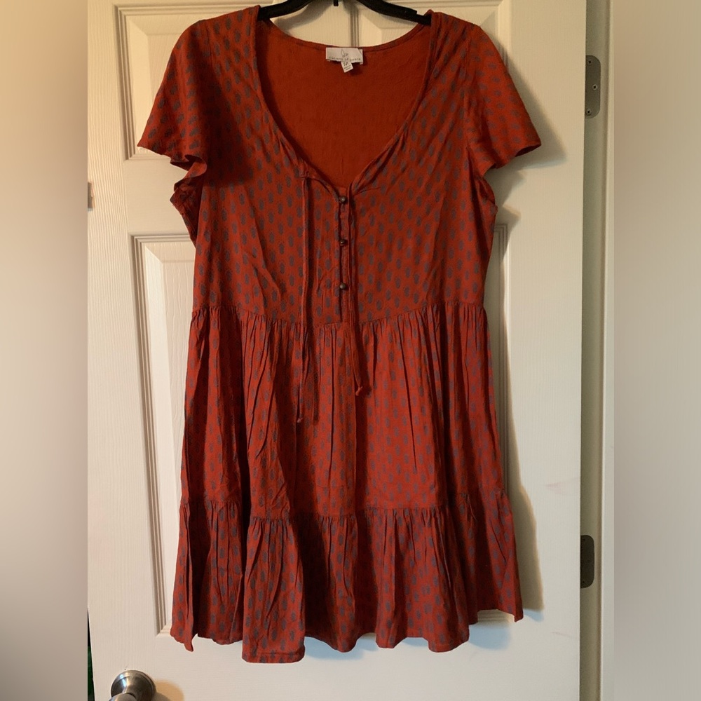 Patrons of peace dress orange with blue details